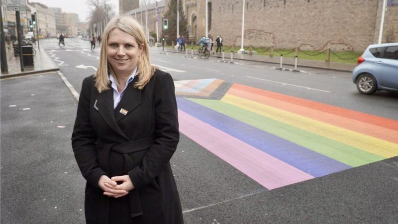 Hannah with Progress Flag artwork in Cardiff